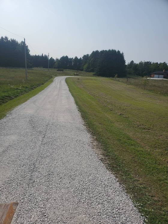Finished gravel path along a field